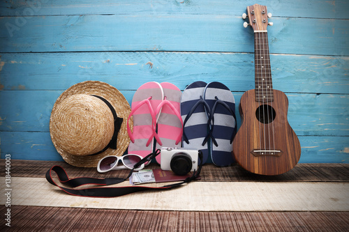 Summer holiday background, Beach accessories on  wood table, Vacation and travel items, Red flip flop with sunglasses on wood table
