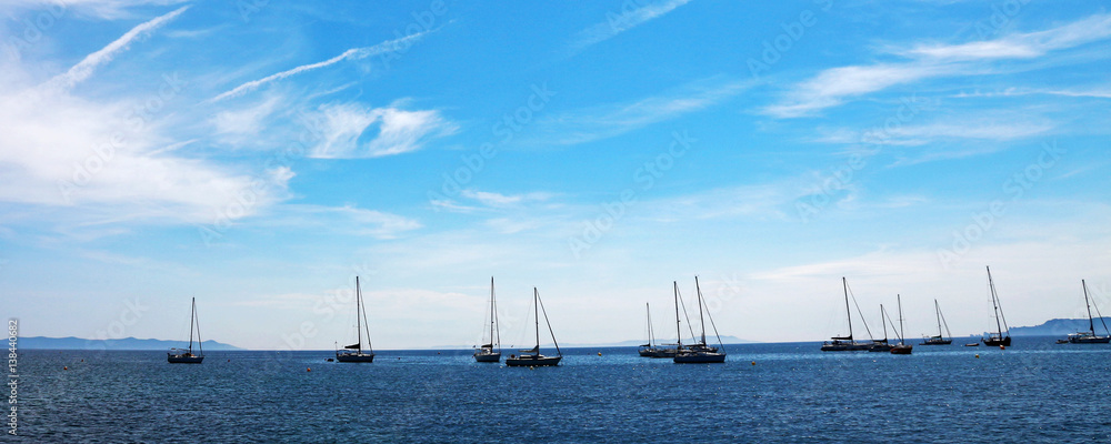 sailboats on the horizon