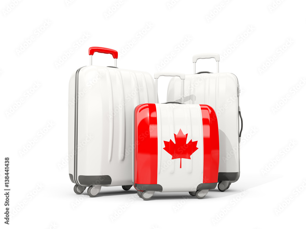 Luggage with flag of canada. Three bags isolated on white Luggage with flag of canada. Three bags isolated on white