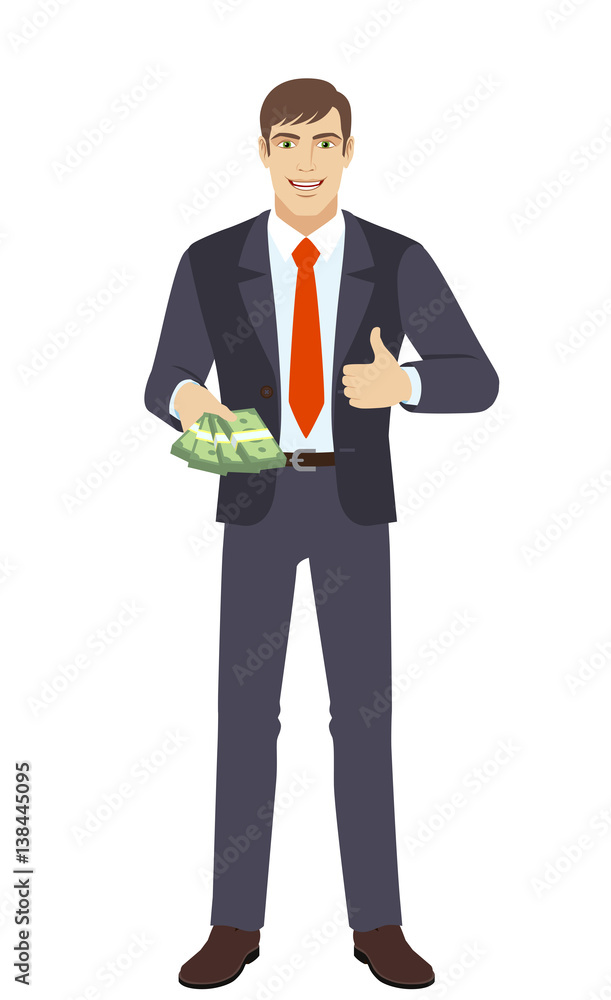 Businessman with money shows thumb up Businessman with money shows thumb up