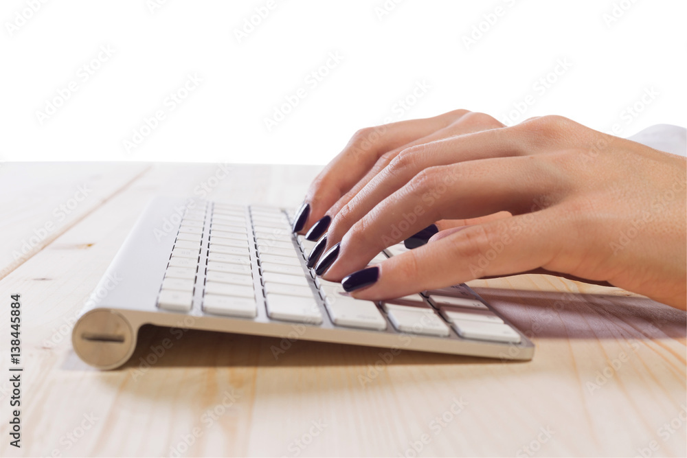Woman with perfect manicure typing on keyboard Woman with perfect manicure typing on keyboard