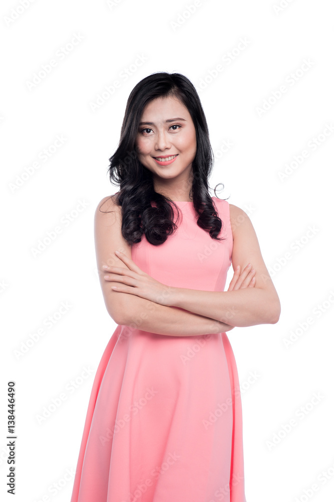 Asian young beautiful woman with long black hair in pink dress standing over white. Asian young beautiful woman with long black hair in pink dress standing over white.