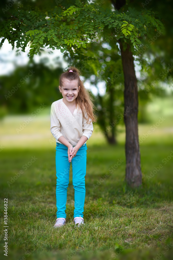 child standing near tree child standing near tree