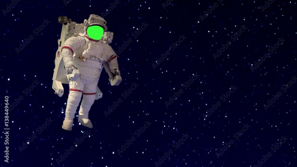 An astronaut on a spacewalk floating in outer space with stars of the galaxy in view, green key to replace face An astronaut on a spacewalk floating in outer space with stars of the galaxy in view, green key to replace face