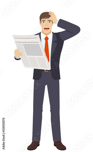 Businessman with newspapergrabbed his head