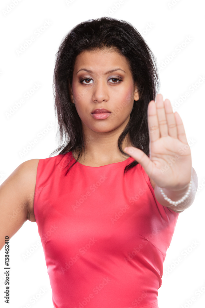 Mixed race woman showing stop sign gesture. Mixed race woman showing stop sign gesture.