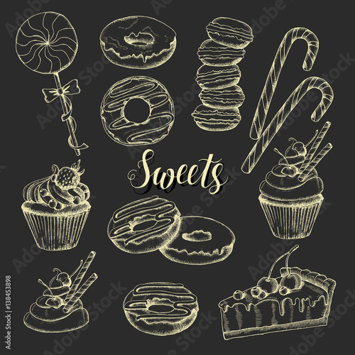 Sweet set of candies, macaroons, donuts, cake and cupcakes on black. Hand drawn, Sketch.