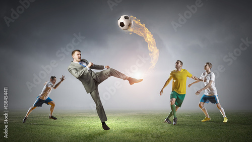 Soccer player kicking ball . Mixed media © Sergey Nivens