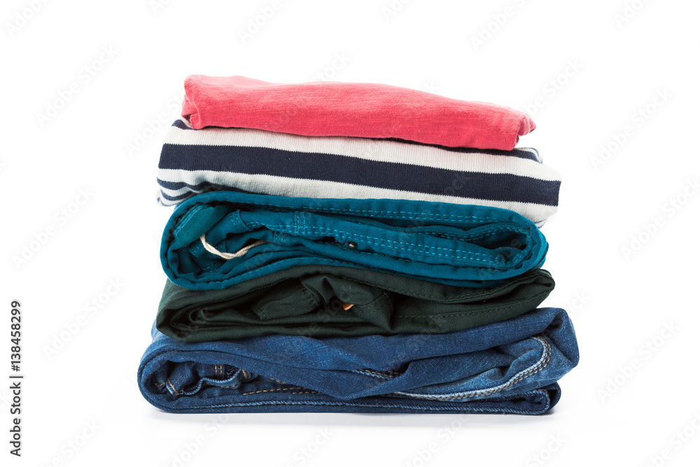 Stack of clothes on white background, closeup Stack of clothes on white background, closeup