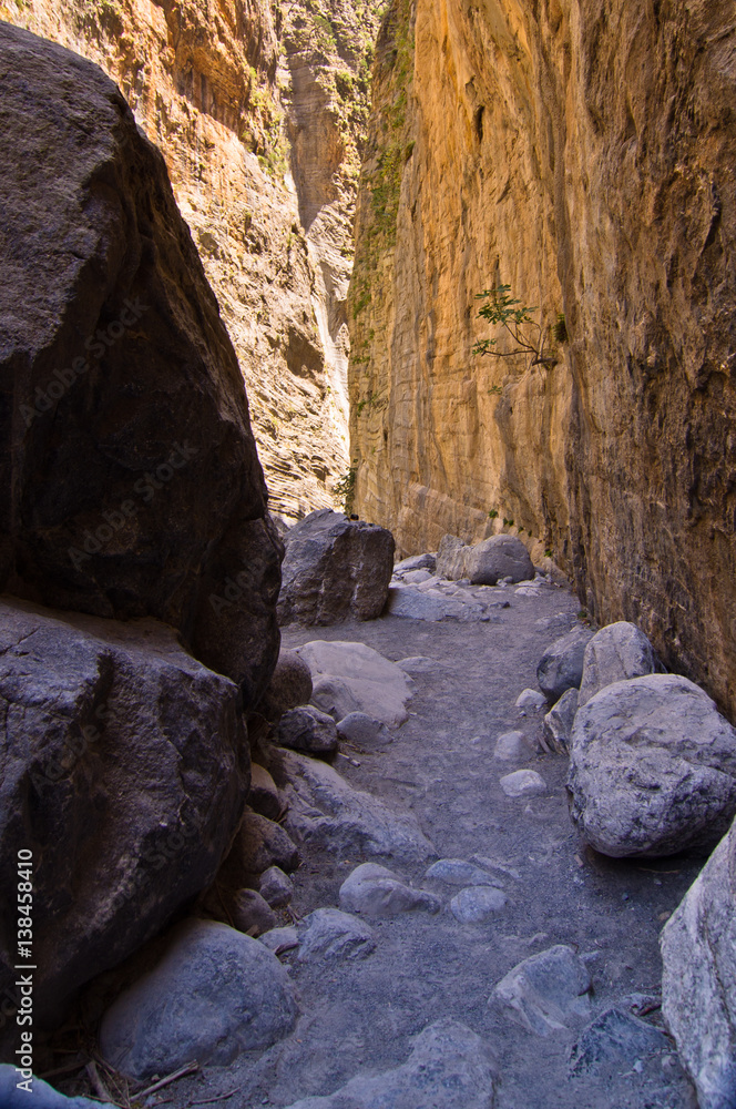 Pathway through iron gate, narrowest part of Samaria gorge, island of Crete, Greece