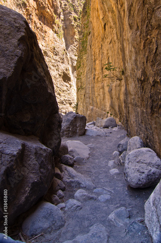 Pathway through iron gate, narrowest part of Samaria gorge, island of Crete, Greece