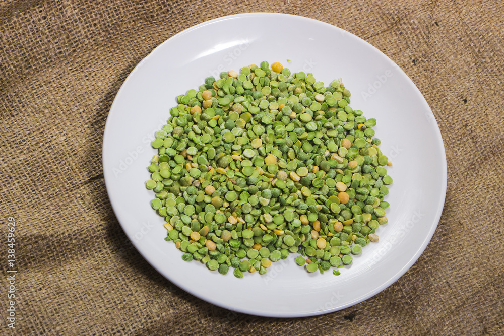 fruits green peas on a white plate fruits green peas on a white plate