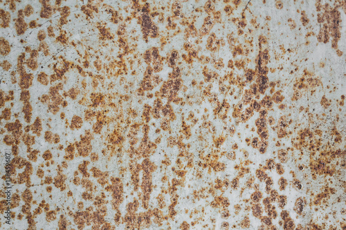 Rusty metal texture. Dark worn rusty and cracked metal texture background.