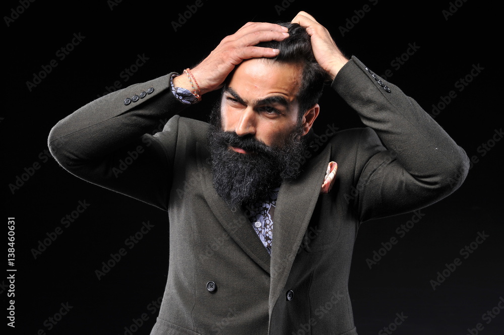fashion man hold to hairs fashion man hold to hairs