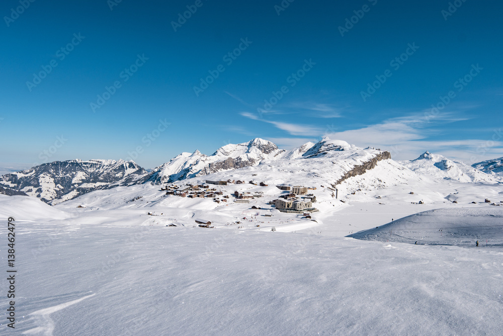 Winter in Swiss alps on a sunny day during a freeride session