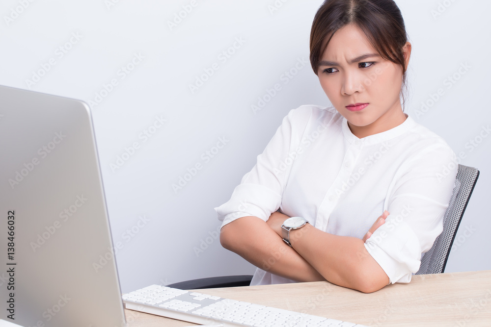 Serious woman use the computer Serious woman use the computer