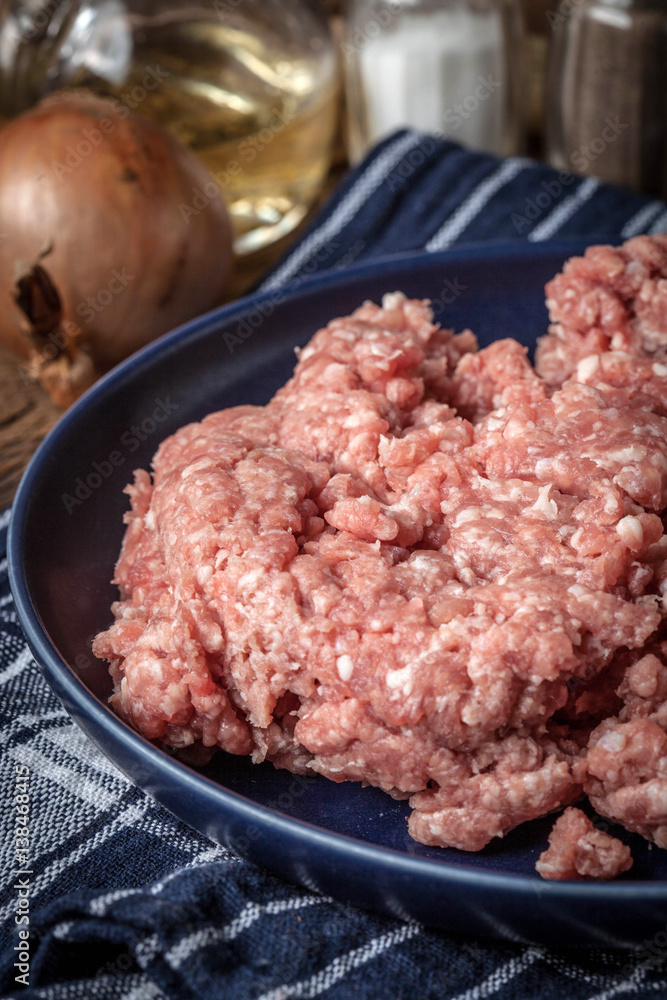 Minced meat on wooden background. Minced meat on wooden background.