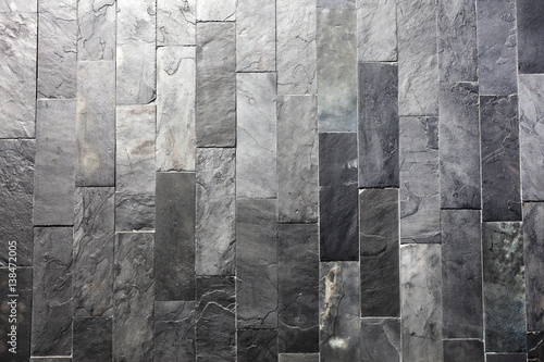 Textured slate wall.