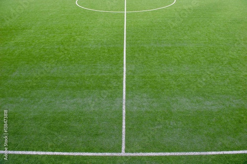 Fototapeta Naklejka Na Ścianę i Meble -  corner in the football field with artificial turf flag