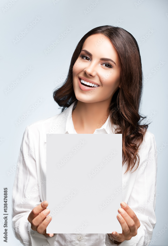 businesswoman showing blank signboard with copyspace businesswoman showing blank signboard with copyspace