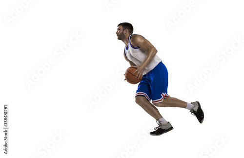 professional basketball player running with ball on white isolated