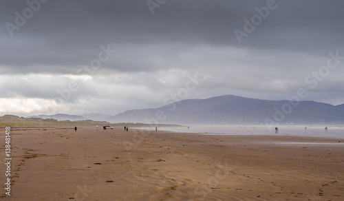 Visitors taking a walk on the beautiful Inch beach  Dingle bay  Republic of Ireland.