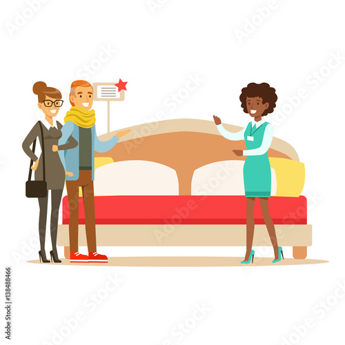Store Seller Demonstrating King Size Bed To Couple, Smiling Shopper In Furniture Shop Shopping For House Decor Elements