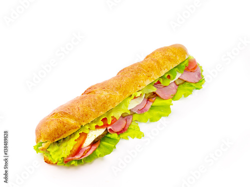 long sandwich with tomatoes and juicy sausage on a white background 2