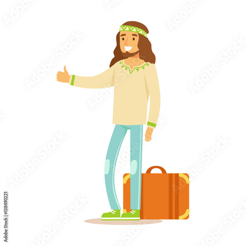 Guy Hippie Dressed In Classic Woodstock Sixties Hippy Subculture Clothes Hiitchhiking With Suitcase