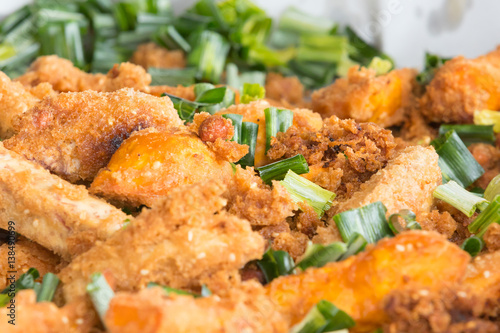 fried chicken in breadcrumbs with chives