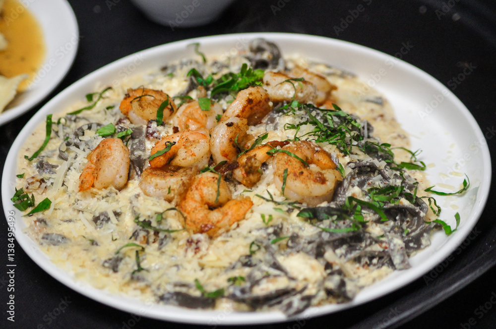Pasta with shrimp in white sauce. Pasta with shrimp in white sauce.