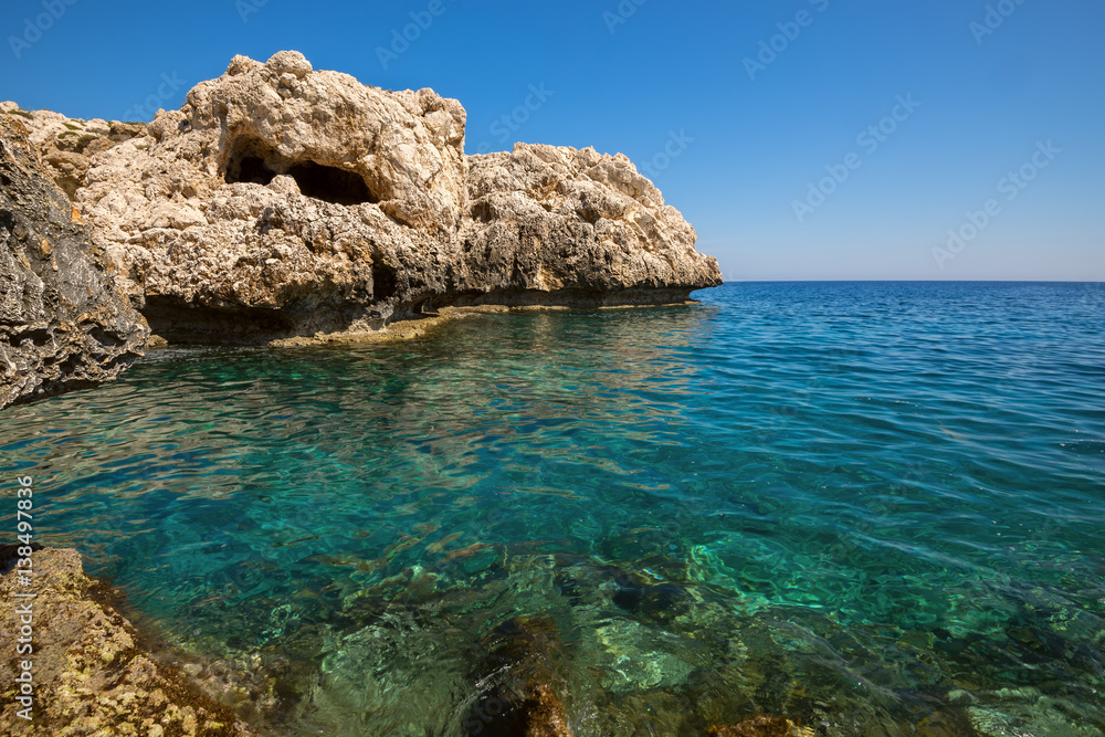 Wonderful rocky coast with caves and grottoes