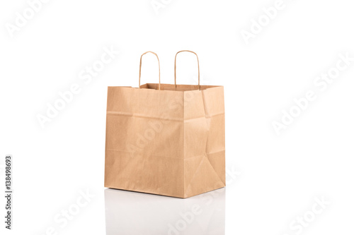 Paper shopping bag on white