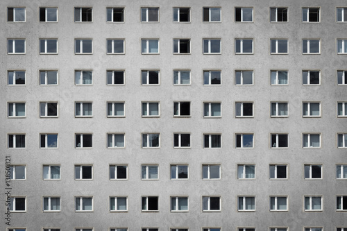 many windows on building facade - apartment block