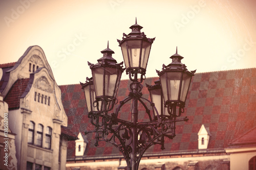 photo of beautiful lamp post and vintage old roof in Wroclaw, Poland