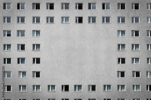 Photography many windows on building facade - plattenbau