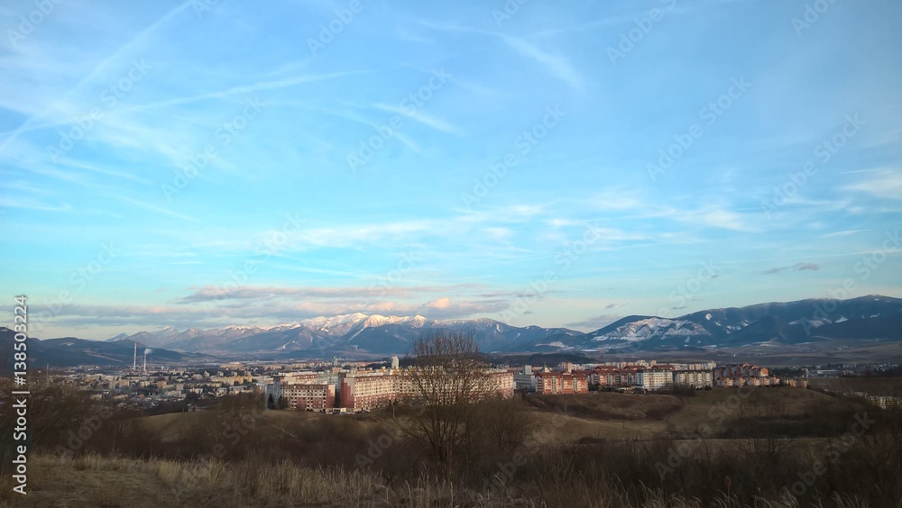 Sunset over the hills and town. Slovakia