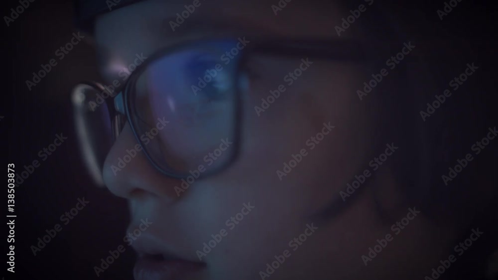 4K Close-up PC Reflection in Glasses of a Child Eyes 4K Close-up PC Reflection in Glasses of a Child Eyes
