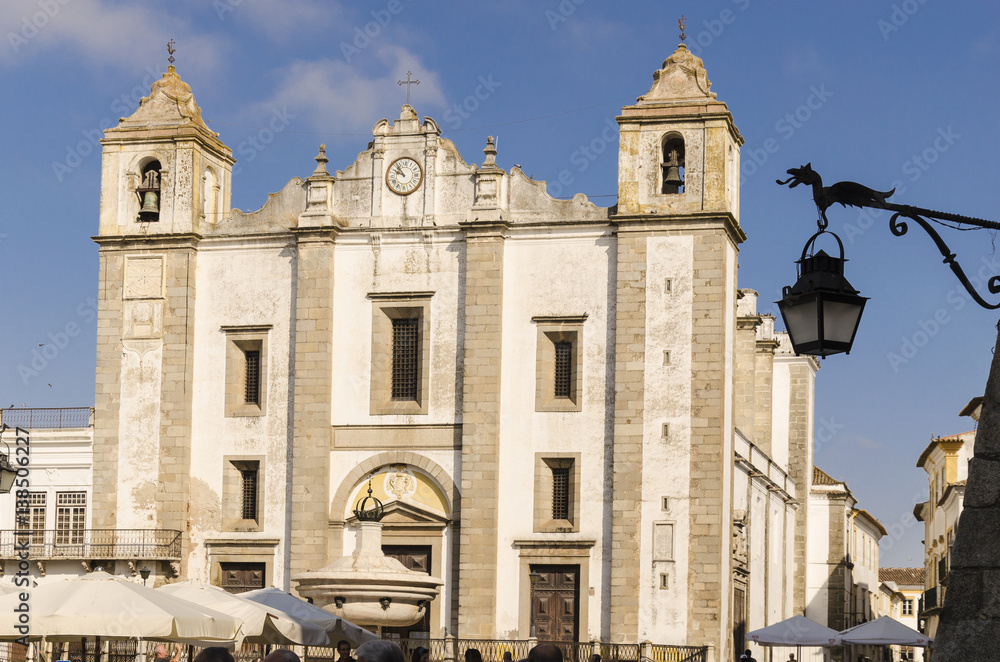 church in portugal, view of the facade of the church in the main square of evora, unesco heritage site