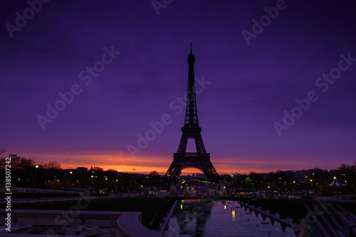 Awesome incredible pink-orange-lilac sunrise. View of the Eiffel Tower from the Trocadero. Beautiful morning cityscape. Paris. France.