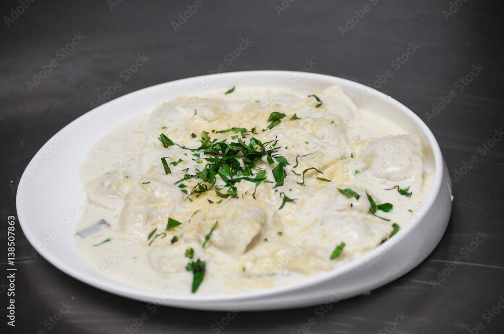 A pasta dish in an Italian restaurant. A pasta dish in an Italian restaurant.