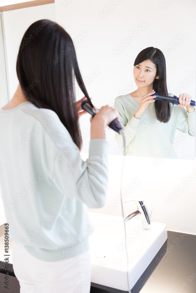 attractive asian woman in powder room