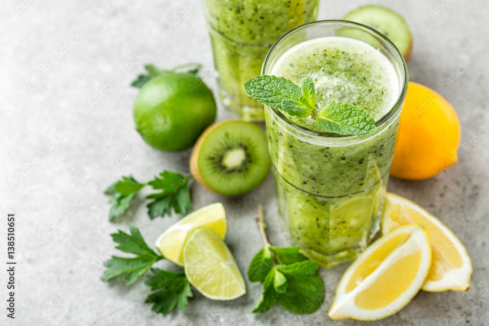 fat burning green fruit cocktail with kiwi, lemon, mint and parsley for slimming and healthy diet fat burning green fruit cocktail with kiwi, lemon, mint and parsley for slimming and healthy diet