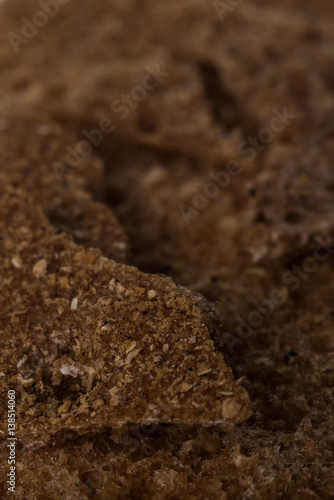 Food background of broken rye crispbreads close