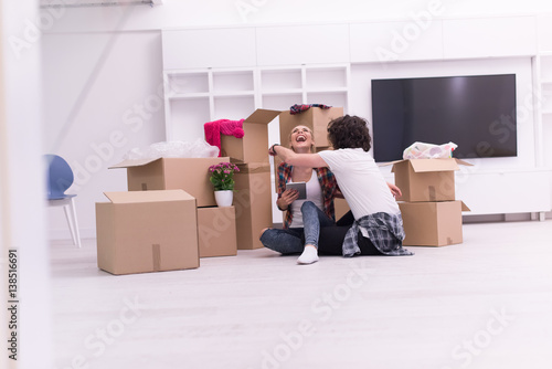 young couple moving in new house