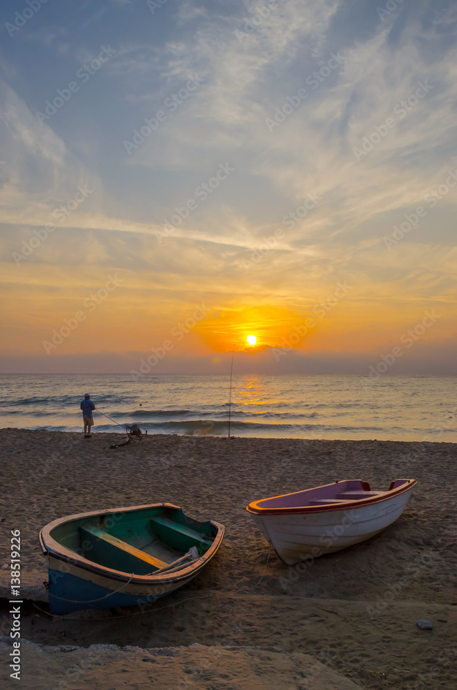 Sunset on the beach. Colorful dawn over the sea. Dramatic sky Sunset on the beach. Colorful dawn over the sea. Dramatic sky