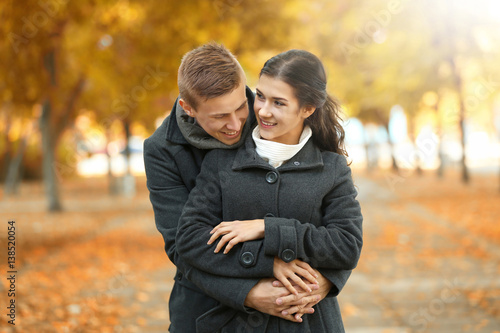 Beautiful young couple outd...