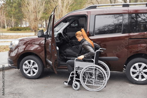 Young woman in a wheelchair...