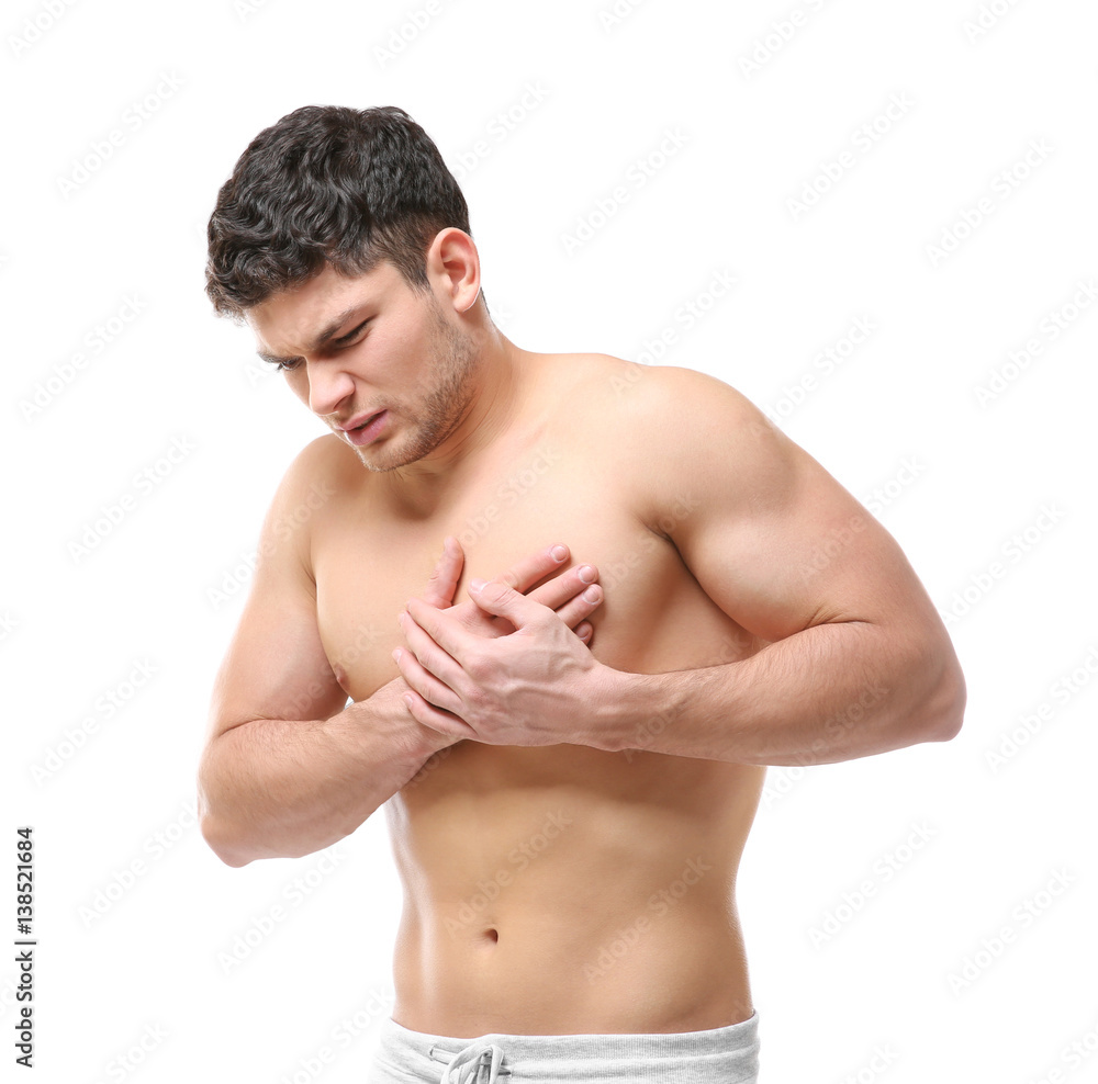 Handsome young man having heart attach on white background Handsome young man having heart attach on white background