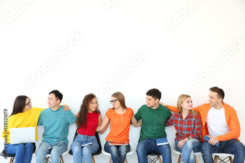 Group of people with books ...